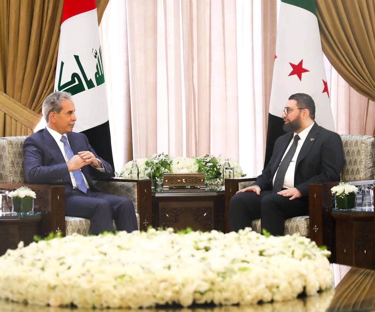 وزير العدل السوري مظهر الويس ورئيس مجلس القضاء الأعلى العراقي فائق زيدان